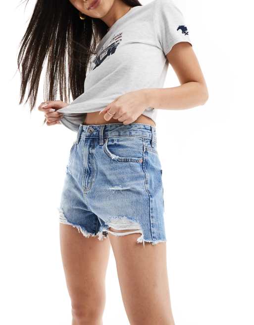 Stradivarius - Gescheurde denim short in medium blauw