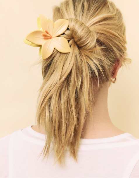 Stradivarius – Guldfärgad hårklämma med blomdesign - view 1