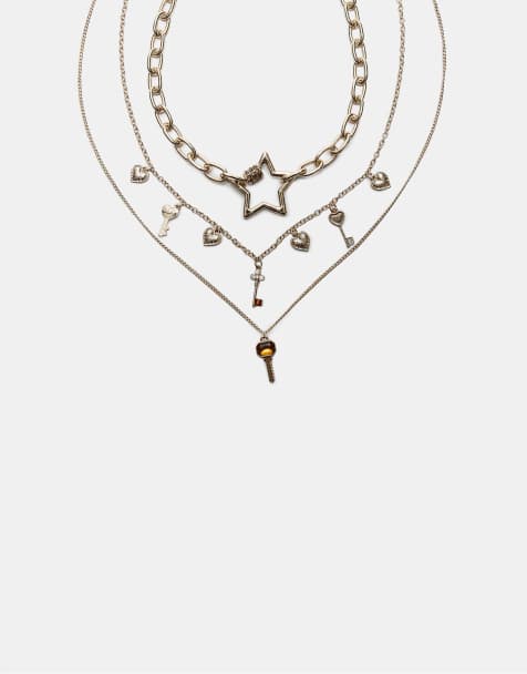 Stradivarius – Guldfärgade halsband med stjärna och berlocker, 3-pack - view 1