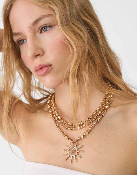 Stradivarius – Guldfärgat, långt halsband med solhänge - view 1