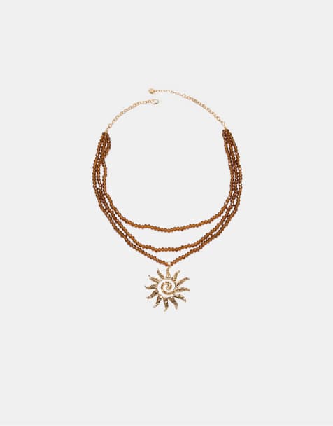 Stradivarius – Halskette in Goldoptik mit Sonnenanhänger und Perlen - view 1