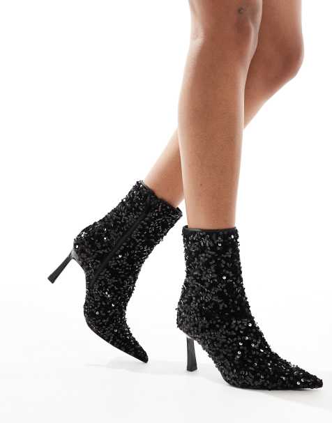 Stradivarius heeled ankle boot with sequins in black - view 1