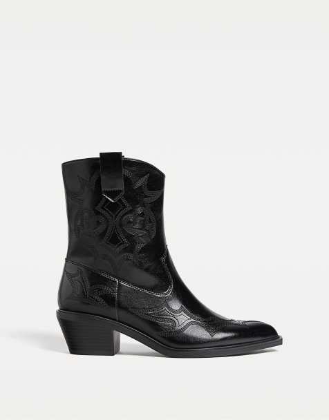 Stradivarius Heeled cowboy ankle boots in black - view 1