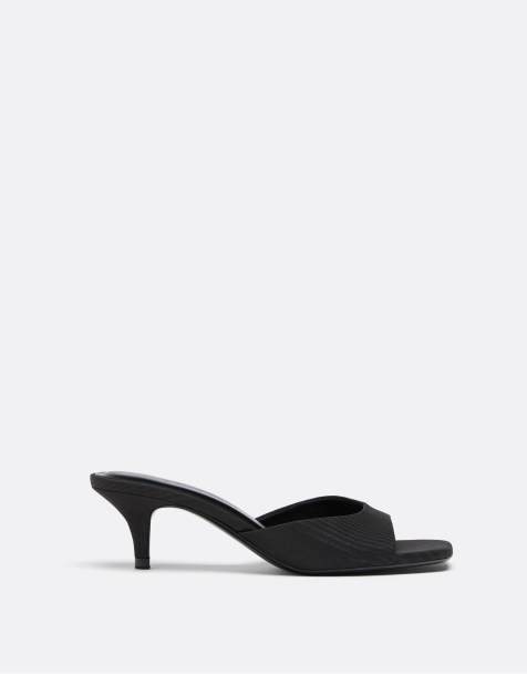 Stradivarius Heeled mule sandals in black - view 1