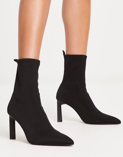 Stradivarius heeled sock boot in black | ASOS