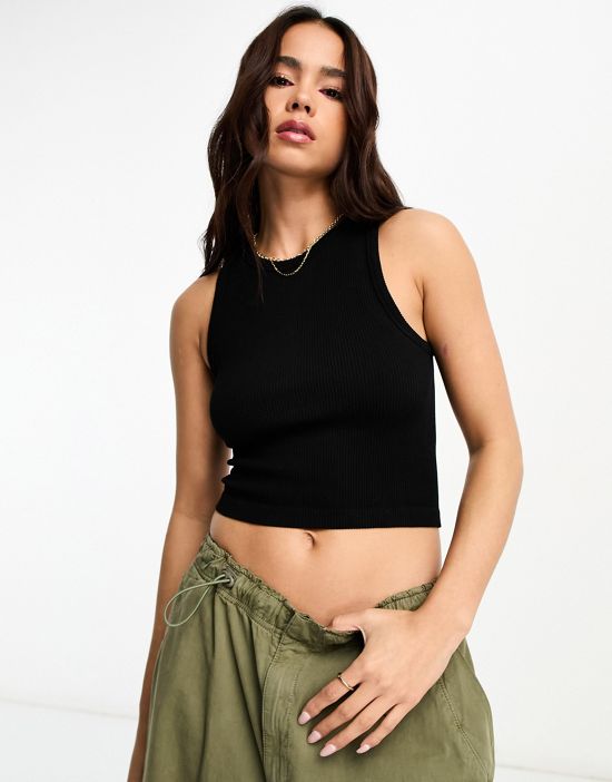 https://images.asos-media.com/products/stradivarius-high-neck-seamless-ribbed-tank-top-in-black/204728175-1-black?$n_550w$&wid=550&fit=constrain