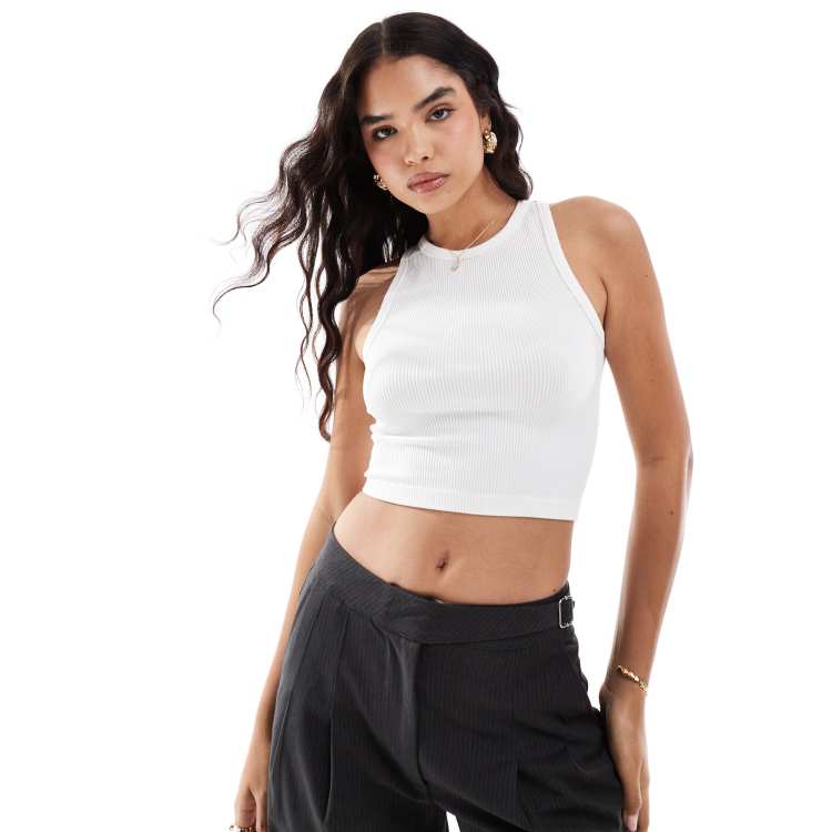 https://images.asos-media.com/products/stradivarius-high-neck-seamless-ribbed-vest-top-in-white/204524504-1-white?$n_750w$&wid=750&hei=750&fit=crop