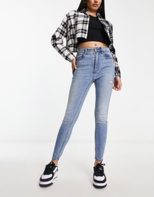 Stradivarius Tall super high-waist skinny jeans in medium blue