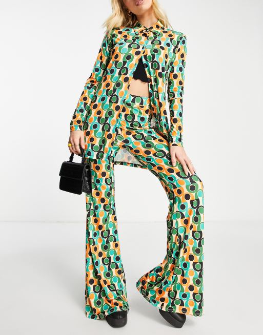 Stradivarius – Hose mit weitem Bein und abstraktem Muster in Orange, Kombiteil