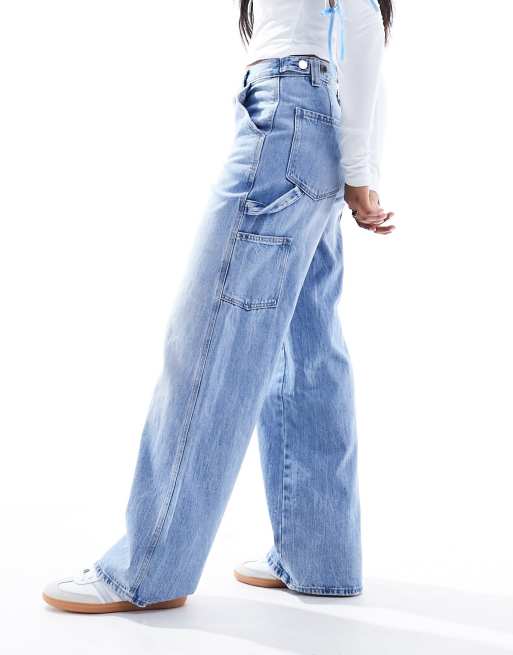 Stradivarius – Jasnoniebieskie jeansy carpenter z regulowaną talią