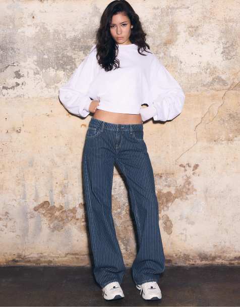 Stradivarius - Jeans ampi a vita medio alta a righe in denim azzurro medio - view 1