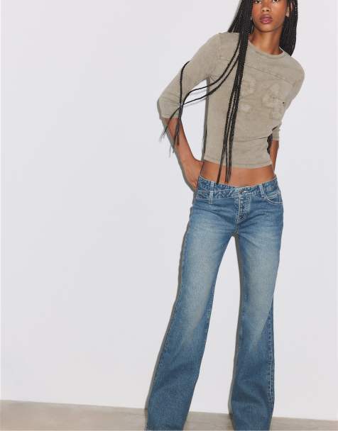 Stradivarius jeans med korsad midja och utsvängda ben i mellanblå denim - view 1