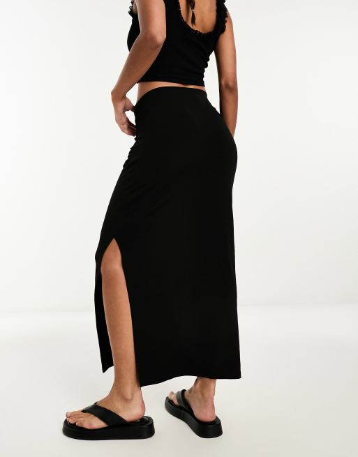 Long black skirt with 2025 slits on both sides