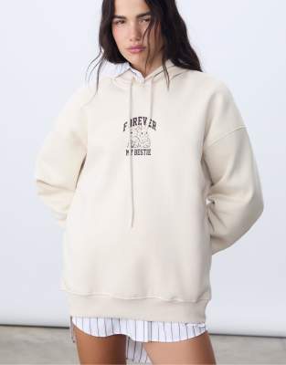 Stradivarius - Kapuzenpullover in Steinbeige mit Grafikprint-Weiß