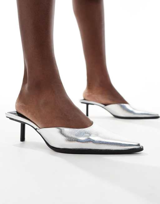 Stradivarius kitten heel mules in silver 
