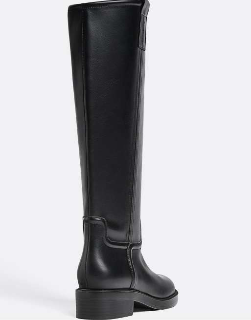 Stradivarius Knee high riding boots in black in black