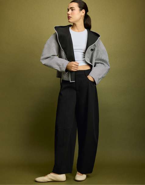 Stradivarius kort vendbar ternet trenchcoat i sort - view 1