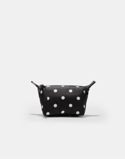 Stradivarius – Kulturbeutel in Schwarz mit Polka Dots - view 1
