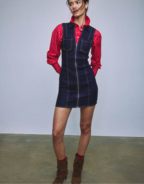 Stradivarius – Kurzes, ärmelloses Jeanskleid in überfärbtem Denimblau mit Reißverschluss - view 1