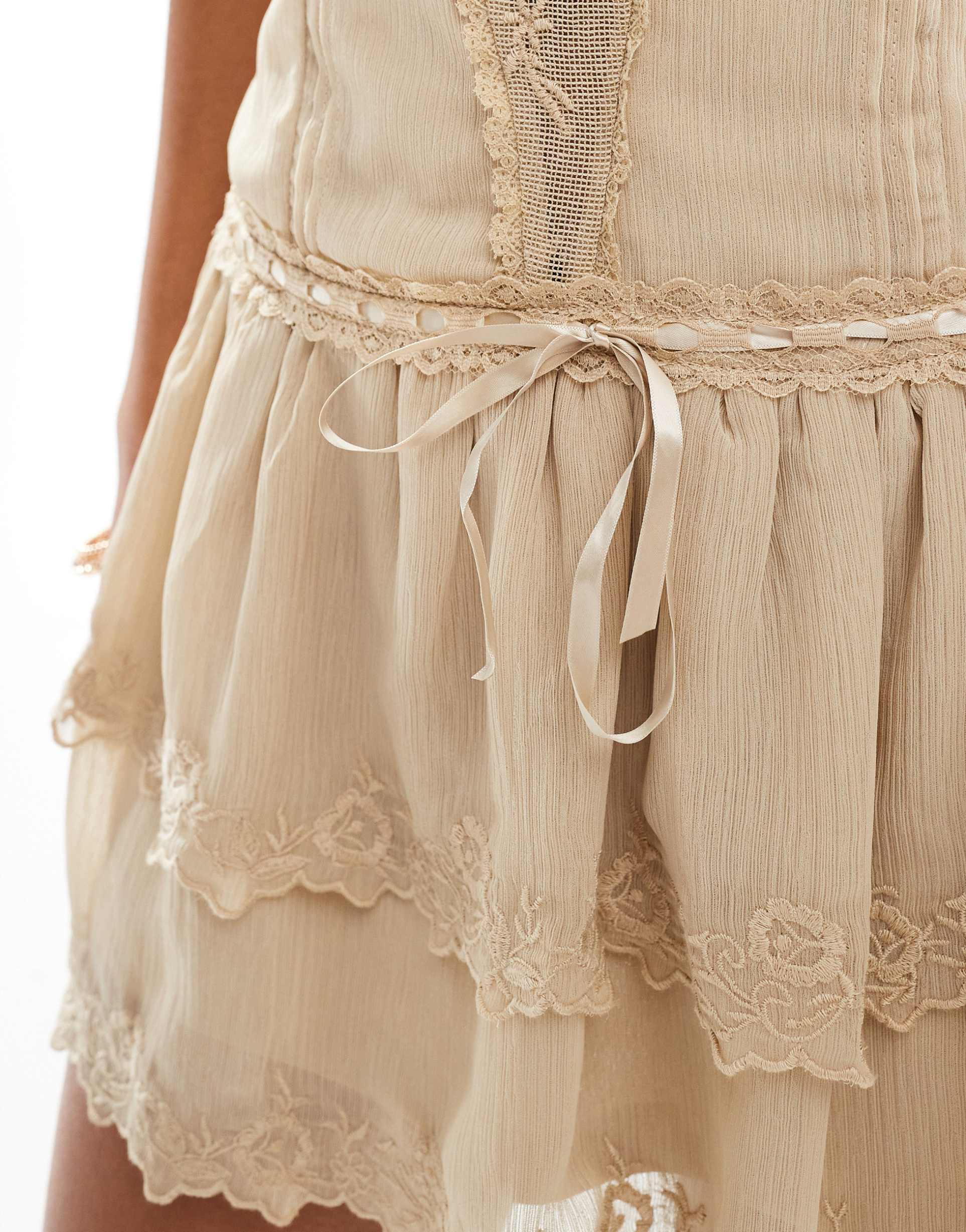 stradivarius lace detail mini cami dress in beige