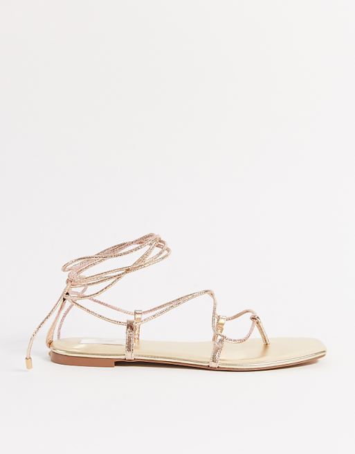 Stradivarius lace up sandal in gold | ASOS