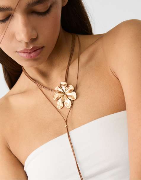 Stradivarius - Lange ketting met bloem in goud - view 1