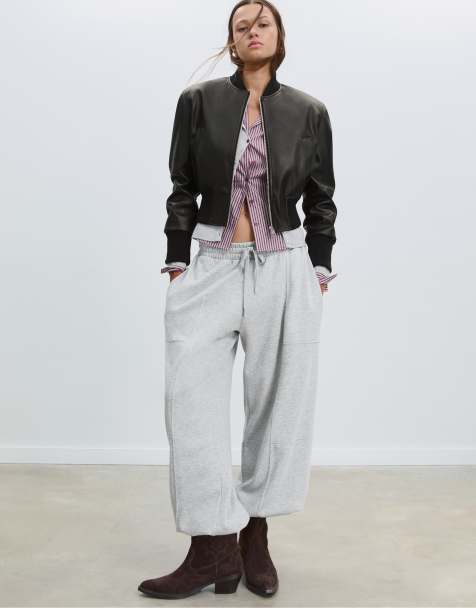 Stradivarius Leather effect bomber jacket with shoulder pads in black - view 1