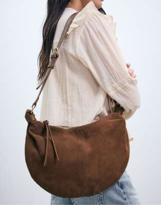  Leather half-moon bag in terracotta