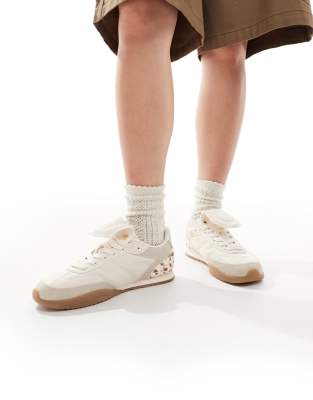  leather trainer in cow print 