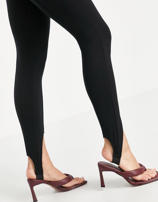 Stradivarius legging with stirrup detail in black - ShopStyle