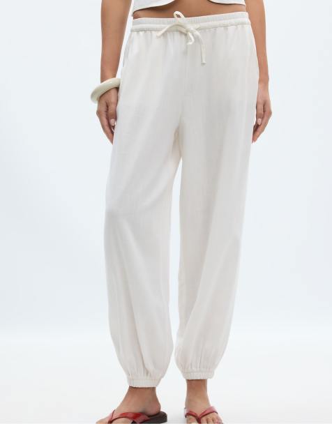 cigarette pants style 5 Ways to Wear Black Cigarette Pants: Desk to Dinner