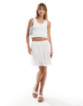 Stradivarius sleeveless buttoned top in white 