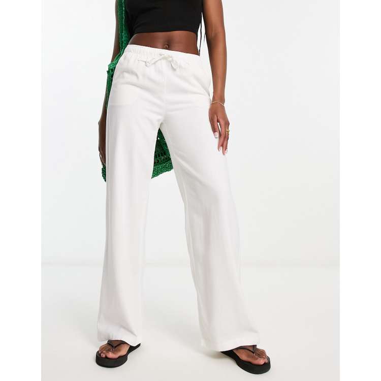 White linen drawstring store trousers