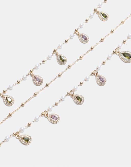 Stradivarius Long multi-charm necklace in gold, 4 of 4