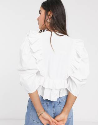 white shirt with frill sleeves