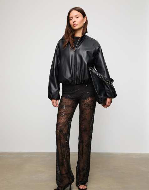 Stradivarius Loose-fitting trousers with sequinned embroidery in black - view 1