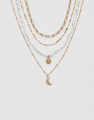 Stradivarius - Lot de 4 colliers avec lune et soleil - Doré-Jaune