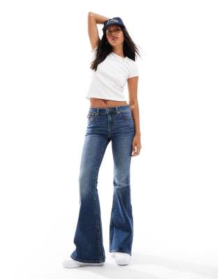 Stradivarius low rise flare jeans in dark blue