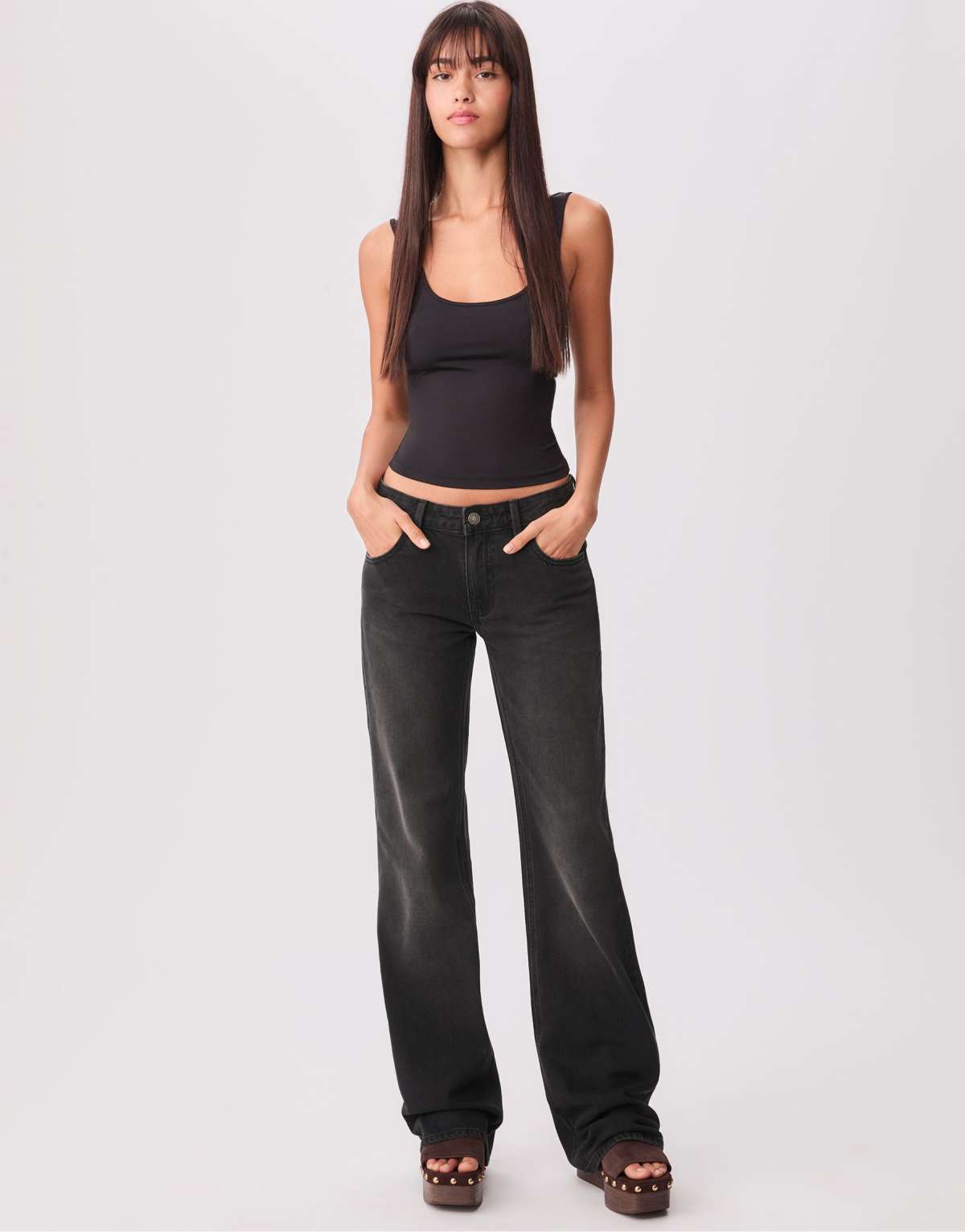 Stradivarius Low-waist flare jeans in black denim washed effect