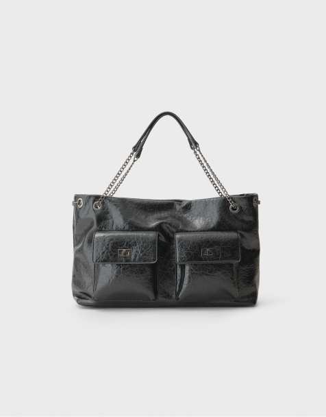 Stradivarius Maxi shoulder bag with pockets in black - view 1