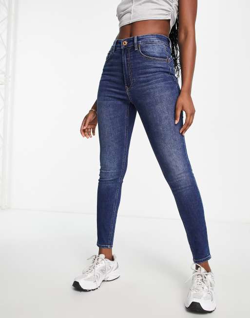 Stradivarius – Mellanblå skinny push up-jeans med slitna partier och hög midja 