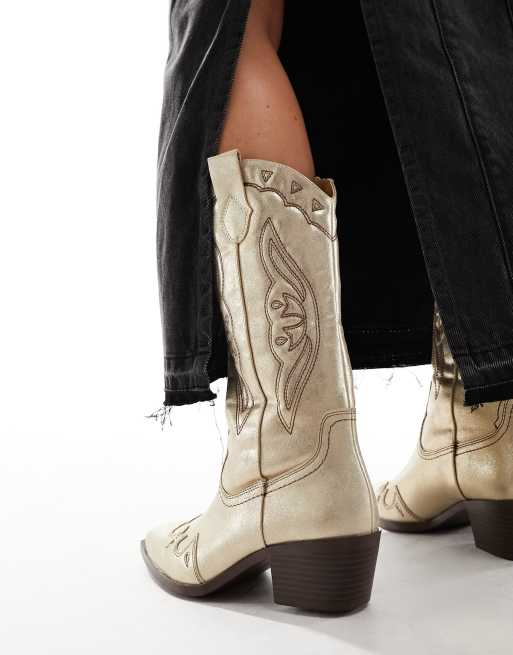 Stradivarius metallic western boots in gold