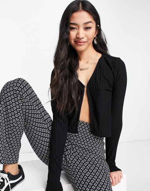 Stradivarius micro cardi with gold trim in black