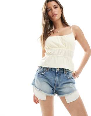 Stradivarius - Micro-Shorts in verwaschenem Blau