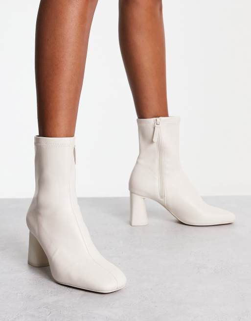 Stradivarius mid heel sock boot in white | ASOS