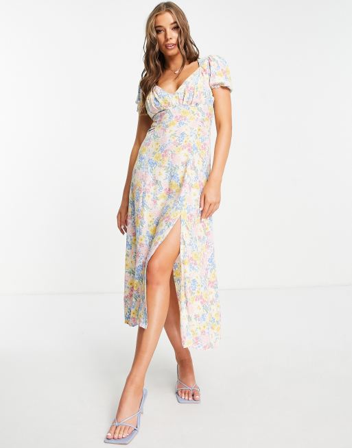 Stradivarius - Midi jurk met split in pastelkleurige bloemenprint