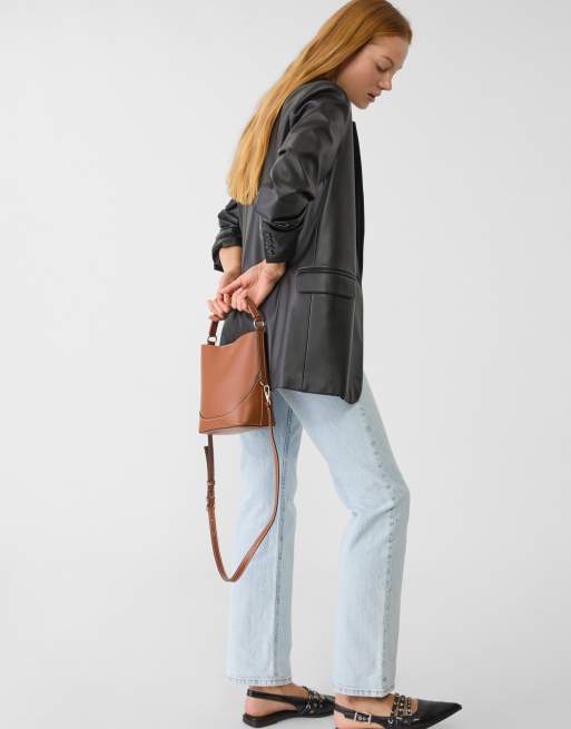 Stradivarius mini bucket bag with strap in pale camel | ASOS