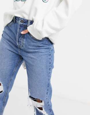Stradivarius - Mom jeans vintage strappati in cotone organico blu medio |  ASOS