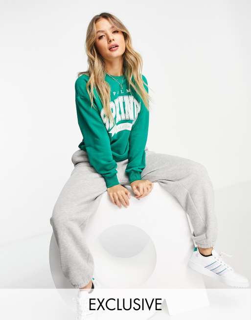 Stradivarius motif Palm springs sweat in green