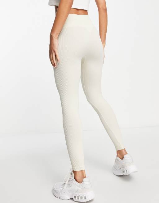 Stradivarius – Nahtlose Leggings mit Rippenstruktur in Beige